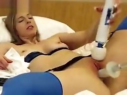 AvaScarlett plays with a vibrator and a sex machine